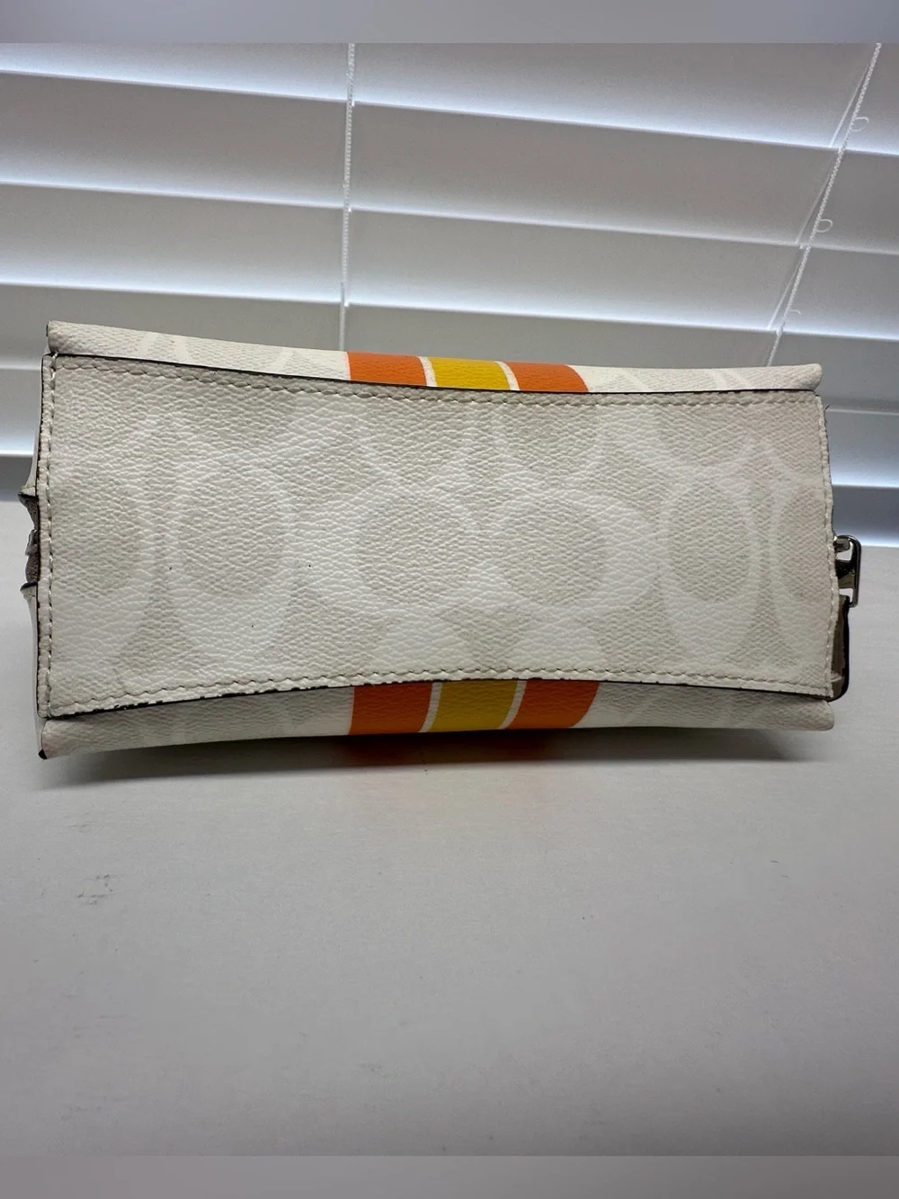 Coach Cosmetic Pouch in Cream with Orange Stripes with purple Glitter pouch